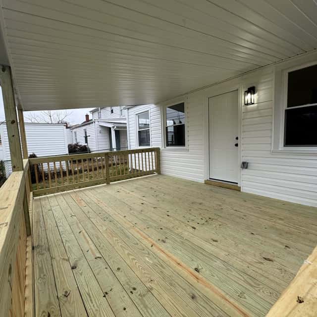 Covered porch with new pressure-treated decking — Sky Property INC, Baltimore, MD