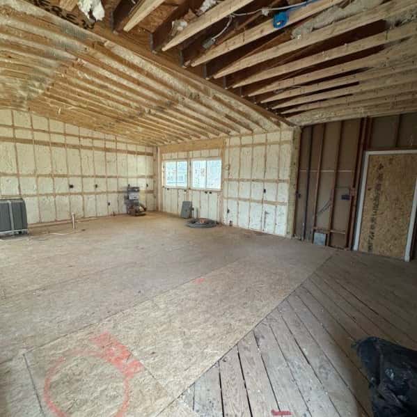 Open framed room with fresh subfloor — Sky Property INC, Baltimore, MD