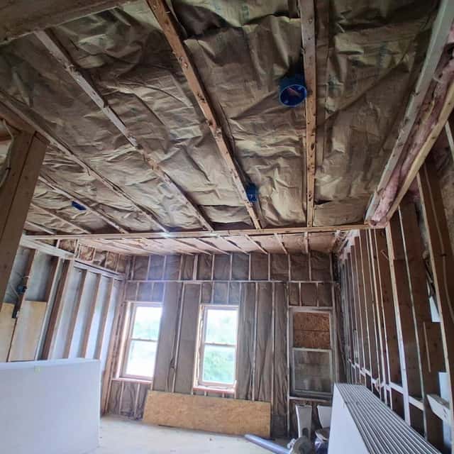 Room stripped to the studs with insulation exposed — Sky Property INC, Baltimore, MD
