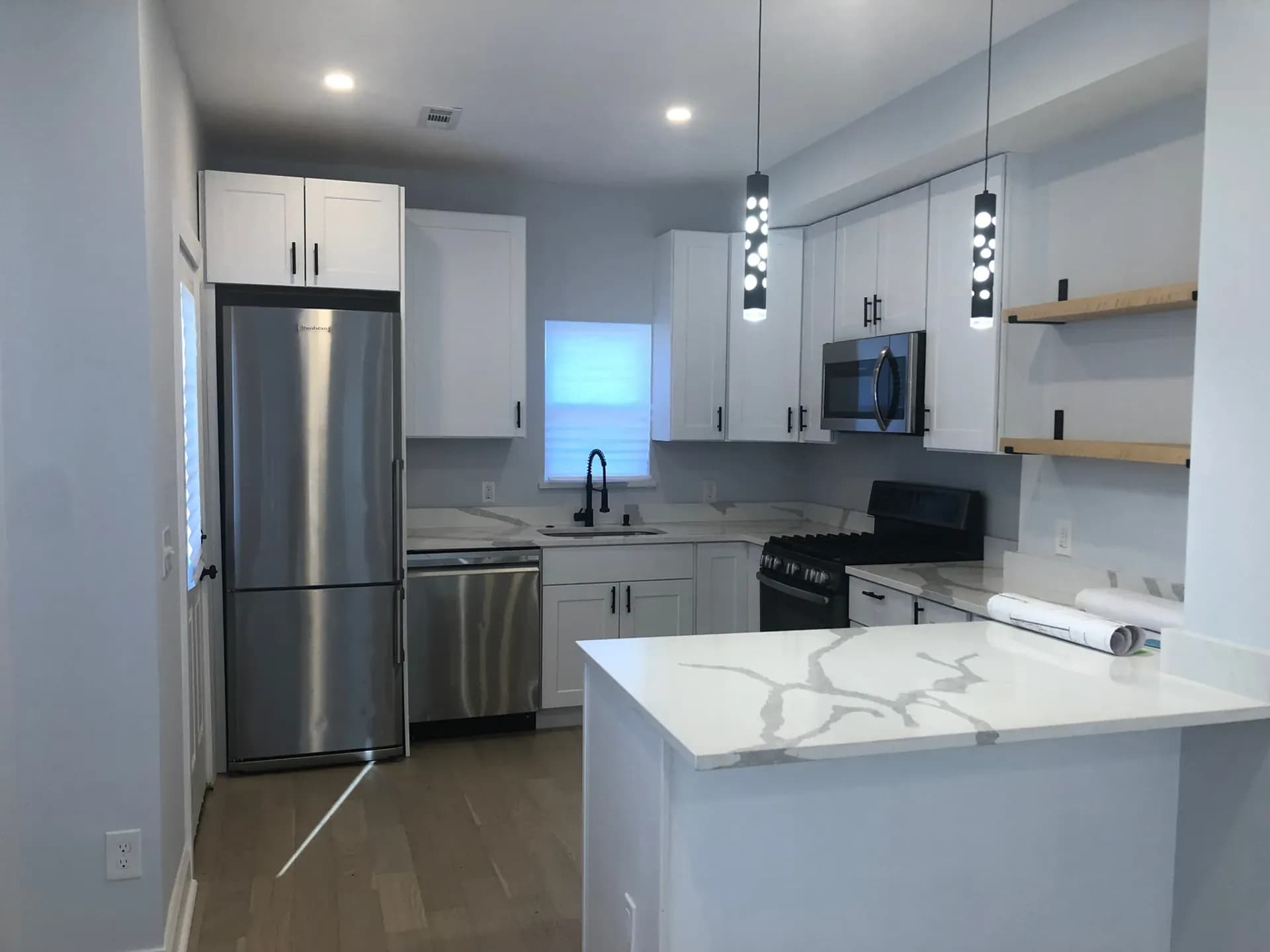 Renovated kitchen completed by Sky Property INC